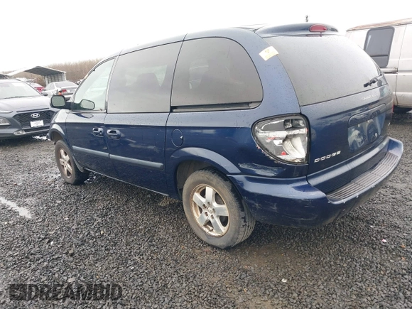 2005 Dodge Caravan SXT with VIN 1D4GP45R45B159286, listed as a IAAI auction lot 41688841 with 198,543 mi miles. Bid and sale history available at carsss.com. Image 3.