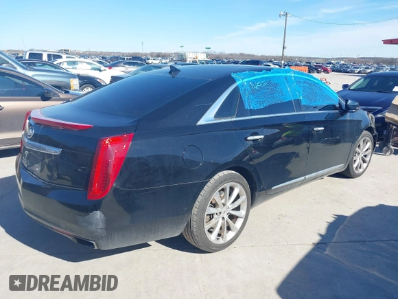 2013 Cadillac XTS Luxury with VIN 2G61P5S31D9116567, listed as a IAAI auction lot 41668056 with 196,744 mi miles. Bid and sale history available at carsss.com. Image 4.