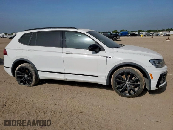 2021 Volkswagen Tiguan SE z VIN 3VV3B7AX9MM003432, wystawiony jako Copart lot #63422315 z przebiegiem 64 531 mil mil oraz Czysty tytuł • Clean title. Historia ofert i sprzedaży dostępna na DreamBid. Obrazek 4.