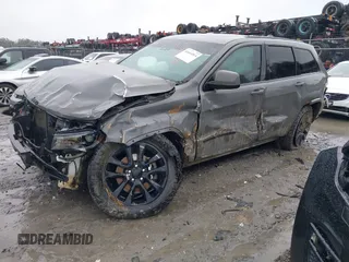 2021 Jeep Grand Cherokee Laredo X z VIN 1C4RJFAG9MC590268, wystawiony jako IAAI lot #41614514 z przebiegiem 60 933 mil mil oraz . Historia ofert i sprzedaży dostępna na DreamBid. Obrazek 2.