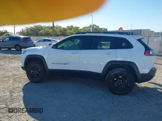 2022 Jeep Cherokee X with VIN 1C4PJMCX2ND533284, listed as a IAAI auction lot 41827335 with 19,404 mi miles. Bid and sale history available at carsss.com. Image 15.