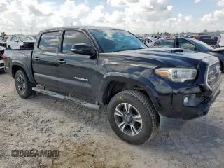 2017 Toyota Tacoma SR5 with VIN 5TFCZ5AN1HX102498, listed as a Copart auction lot 61499425 with 210,433 mi miles and Salvage title. Bid and sale history available at DreamBid. Image 4.