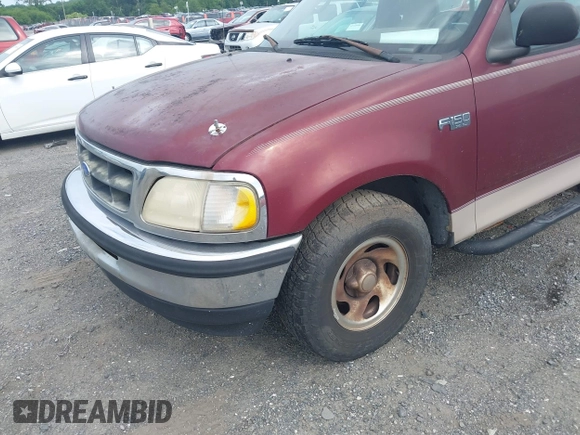 1997 Ford F-150 with VIN 1FTDF1720VNB30982, listed as a IAAI auction lot 42764577 with 296,424 mi miles and . Bid and sale history available at DreamBid. Image 6.
