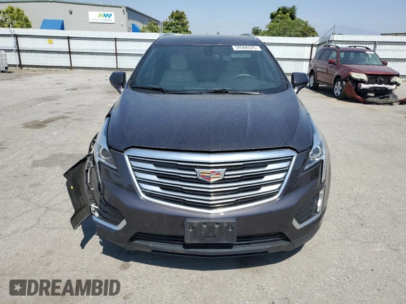 2018 Cadillac XT5 FWD with VIN 1GYKNARS5JZ155879, listed as a Copart auction lot 59568525 with 88,376 mi miles and Salvage title. Bid and sale history available at DreamBid. Image 5.