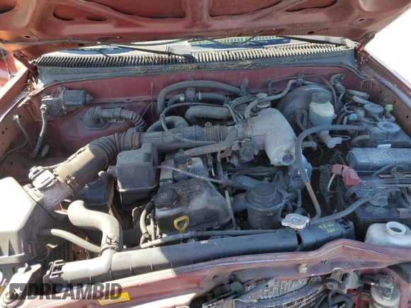 2001 Toyota Tacoma with VIN 5TEWM72NX1Z842202, listed as a Copart auction lot 53111405 with 304,857 mi miles and Salvage title. Bid and sale history available at DreamBid. Image 12.