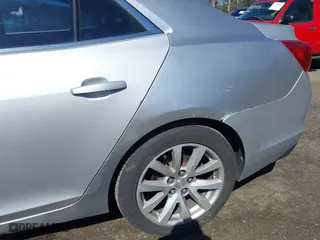 2013 Chevrolet Malibu LT with VIN 1G11E5SA9DF332443, listed as a IAAI auction lot 41853909 with 269,618 mi miles. Bid and sale history available at carsss.com. Image 12.