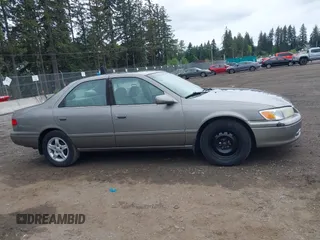 2001 Toyota Camry CE z VIN 4T1BG22K31U097733, wystawiony jako IAAI lot #42276687 z przebiegiem 180 357 mil mil oraz . Historia ofert i sprzedaży dostępna na DreamBid. Obrazek 13.