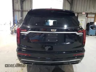 2023 Cadillac XT6 AWD Premium Luxury with VIN 1GYKPFRS3PZ121942, listed as a Copart auction lot 46489545 with 35,453 mi miles and Salvage Title. Bid and sale history available at carsss.com. Image 6.