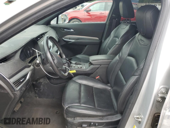 2020 Cadillac XT4 FWD Premium Luxury with VIN 1GYFZCR45LF027018, listed as a Copart auction lot 55537625 with 98,651 mi miles and Salvage title. Bid and sale history available at DreamBid. Image 7.