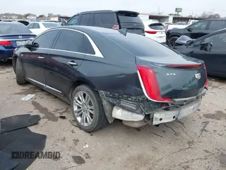2018 Cadillac XTS Luxury with VIN 2G61M5S30J9164758, listed as a IAAI auction lot 41648265 with 173,134 mi miles and . Bid and sale history available at carsss.com. Image 3.