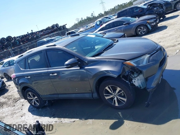 2018 Toyota RAV4 XLE with VIN 2T3WFREV9JW503136, listed as a IAAI auction lot 41815266 with 118,585 mi miles. Bid and sale history available at carsss.com. Image 13.