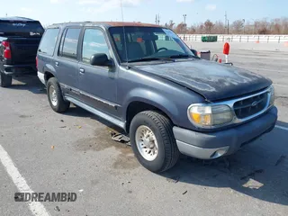 1999 Ford Explorer XLT z VIN 1FMZU32E6XUA07927, wystawiony jako IAAI lot #41489418 z przebiegiem 246 806 mil mil oraz . Historia ofert i sprzedaży dostępna na DreamBid. Obrazek 1.