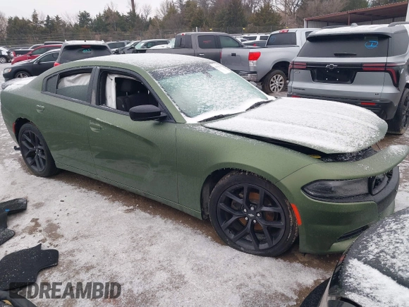 2021 Dodge Charger SXT with VIN 2C3CDXBG5MH570330, listed as a IAAI auction lot 41558328 with 119,828 mi miles. Bid and sale history available at carsss.com. Image 1.