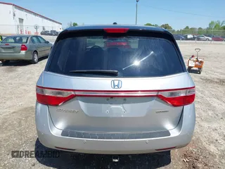 2012 Honda Odyssey Touring with VIN 5FNRL5H96CB043939, listed as a IAAI auction lot 41983643 with 202,535 mi miles. Bid and sale history available at carsss.com. Image 17.