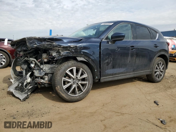 2017 Mazda CX-5 Grand Touring with VIN JM3KFBDL8H0163179, listed as a Copart auction lot 49866865 with 53,066 mi miles and Salvage Title. Bid and sale history available at carsss.com. Image 1.