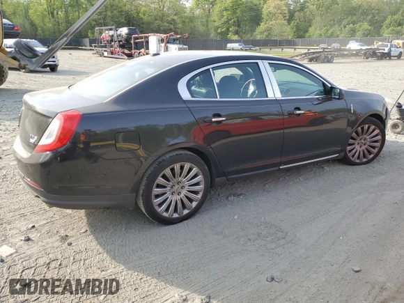 2014 Lincoln MKS with VIN 1LNHL9EK2EG610291, listed as a Copart auction lot 54544745 with 147,075 mi miles and Salvage Title. Bid and sale history available at carsss.com. Image 3.