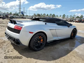 2013 Lamborghini Gallardo z VIN ZHWGU8AJ7DLA12671, wystawiony jako Copart lot #75721804 z przebiegiem 14 849 mil mil oraz Nie do naprawy. Historia ofert i sprzedaży dostępna na DreamBid. Obrazek 3.