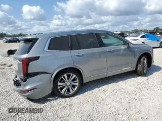 2024 Cadillac XT6 FWD Premium Luxury with VIN 1GYKPCRS1RZ715026, listed as a Copart auction lot 48817915 with 10,550 mi miles and Non Repairable. Bid and sale history available at carsss.com. Image 3.