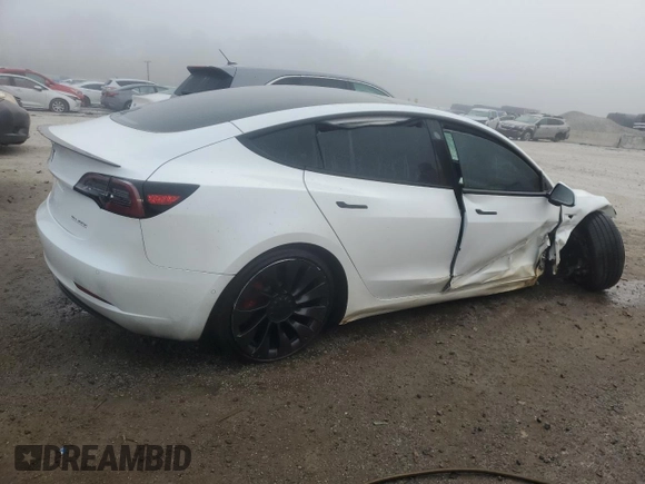 2021 Tesla Model 3 Performance with VIN 5YJ3E1ECXMF984417, listed as a Copart auction lot 48465675 with 60,838 mi miles and Clean Title. Bid and sale history available at DreamBid. Image 3.