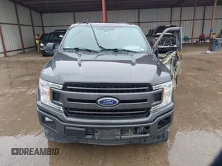 2019 Ford F-150 XL with VIN 1FTEW1C56KKC31025, listed as a IAAI auction lot 41452618 with 153,422 mi miles and . Bid and sale history available at DreamBid. Image 12.