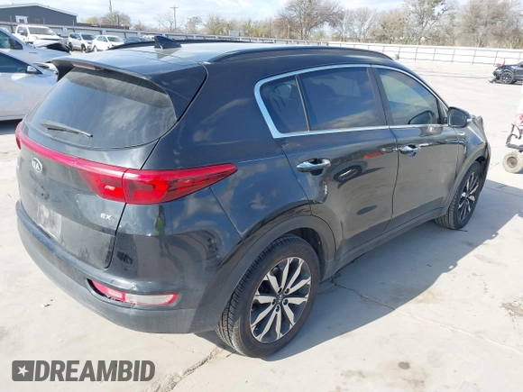 2018 Kia Sportage EX with VIN KNDPN3AC7J7373183, listed as a IAAI auction lot 41169417 with 174,423 mi miles and . Bid and sale history available at DreamBid. Image 4.