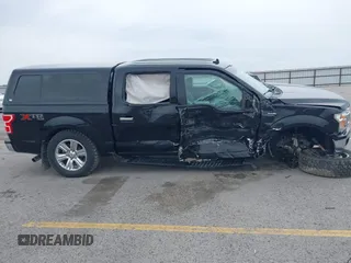 2018 Ford F-150 XL with VIN 1FTEW1E5XJKC37082, listed as a IAAI auction lot 42335721 with 167,401 mi miles and . Bid and sale history available at DreamBid. Image 12.