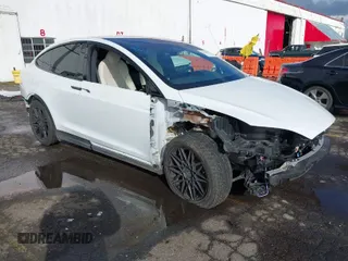 2022 Tesla Model X with VIN 7SAXCDE56NF360208, listed as a IAAI auction lot 41576953 with 9,759 mi miles. Bid and sale history available at carsss.com. Image 1.