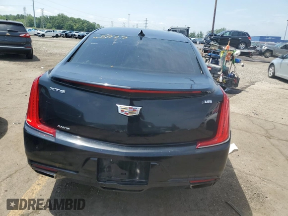 2018 Cadillac XTS Luxury with VIN 2G61N5S34J9155977, listed as a Copart auction lot 62057755 with 98,300 mi miles and Clean title. Bid and sale history available at DreamBid. Image 6.