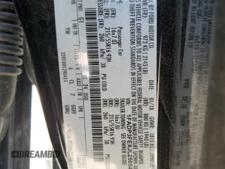 2018 Ford Focus SE z VIN 1FADP3FEXJL256542, wystawiony jako Copart lot #54583915 z przebiegiem 107 774 mil mil oraz Szkoda całkowita • Salvage title. Historia ofert i sprzedaży dostępna na DreamBid. Obrazek 13.