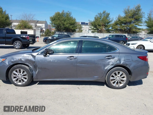 2014 Lexus ES 300h с VIN JTHBW1GG6E2071083, выставлен на аукционе IAAI как лот 41772226 с пробегом 140 710 миль миль и . История ставок и продаж доступна на DreamBid. Изображение 14.