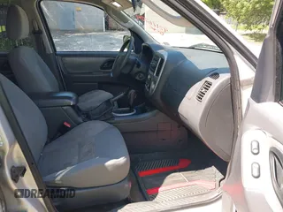 2006 Ford Escape XLT with VIN 1FMYU93106KA12173, listed as a IAAI auction lot 42176724 with 219,471 mi miles and . Bid and sale history available at DreamBid. Image 5.
