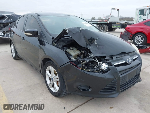 2013 Ford Focus SE with VIN 1FADP3F29DL157950, listed as a IAAI auction lot 41617844 with 128,890 mi miles. Bid and sale history available at carsss.com. Image 1.