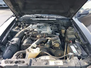 2004 Ford Mustang Deluxe with VIN 1FAFP446X4F187154, listed as a IAAI auction lot 42068363 with 125,074 mi miles. Bid and sale history available at carsss.com. Image 10.