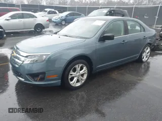 2012 Ford Fusion SE z VIN 3FAHP0HA6CR446630, wystawiony jako IAAI lot #41743485 z przebiegiem 139 547 mil mil oraz . Historia ofert i sprzedaży dostępna na DreamBid. Obrazek 18.