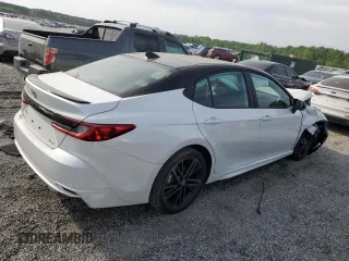 2025 Toyota Camry LE z VIN 4T1DAACK0SU015011, wystawiony jako Copart lot #53547485 z przebiegiem 2 200 mil mil oraz Szkoda całkowita • Salvage title. Historia ofert i sprzedaży dostępna na DreamBid. Obrazek 3.