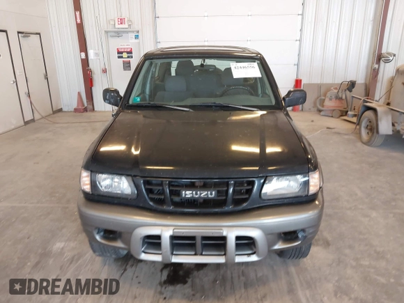 2002 Isuzu Rodeo with VIN 4S2CM57W124335034, listed as a IAAI auction lot 42446556 with 214,718 mi miles and . Bid and sale history available at DreamBid. Image 6.