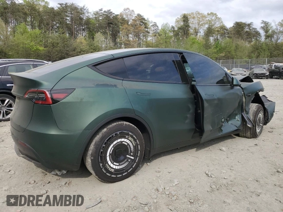 2024 Tesla Model Y Long Range z VIN 7SAYGAEEXRF987104, wystawiony jako Copart lot #54056015 z przebiegiem 24 027 mil mil oraz Szkoda całkowita • Salvage title. Historia ofert i sprzedaży dostępna na DreamBid. Obrazek 3.