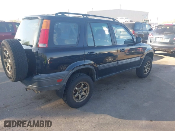 2000 Honda CR-V EX with VIN JHLRD1866YC025833, listed as a IAAI auction lot 42039440 with 238,599 mi miles. Bid and sale history available at carsss.com. Image 4.