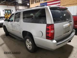 2013 Chevrolet Suburban LS with VIN 1GNSKHE72DR263672, listed as a Copart auction lot 87855905 with 124,081 mi miles and Salvage Title. Bid and sale history available at carsss.com. Image 2.