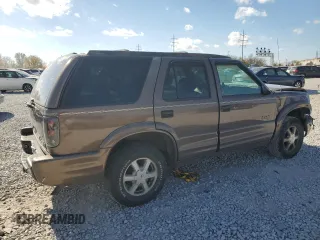 1998 Oldsmobile Bravada z VIN 1GHDT13W7W2721308, wystawiony jako Copart lot #79189484 z przebiegiem 134 924 mil mil oraz Szkody całkowita. Historia ofert i sprzedaży dostępna na DreamBid. Obrazek 3.
