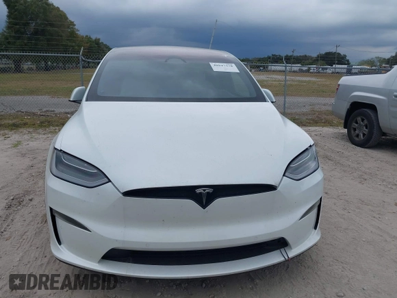 2022 Tesla Model X with VIN 7SAXCBE56NF364067, listed as a IAAI auction lot 40947378 with Not Provided miles and . Bid and sale history available at DreamBid. Image 6.