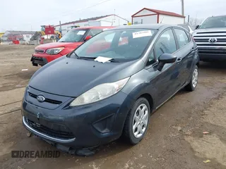2011 Ford Fiesta SE with VIN 3FADP4EJ6BM137939, listed as a IAAI auction lot 41705008 with 161,166 mi miles. Bid and sale history available at carsss.com. Image 17.