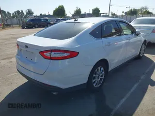 2016 Ford Fusion S z VIN 3FA6P0G79GR157809, wystawiony jako IAAI lot #41994860 z przebiegiem 161 049 mil mil oraz . Historia ofert i sprzedaży dostępna na DreamBid. Obrazek 4.