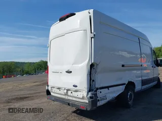 2021 Ford Transit Cargo z VIN 1FTBW3X84MKA60720, wystawiony jako IAAI lot #42202665 z przebiegiem 67 295 mil mil oraz . Historia ofert i sprzedaży dostępna na DreamBid. Obrazek 19.
