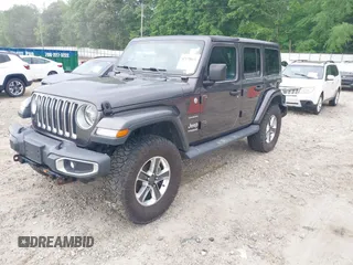 2018 Jeep Wrangler Unlimited Sahara with VIN 1C4HJXEN8JW303023, listed as a IAAI auction lot 42138631 with 72,463 mi miles and . Bid and sale history available at DreamBid. Image 2.