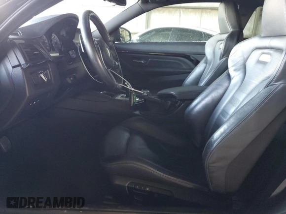 2015 BMW M4 with VIN WBS3R9C54FK335119, listed as a Copart auction lot 42120434 with 57,384 mi miles. Bid and sale history available at carsss.com. Image 7.