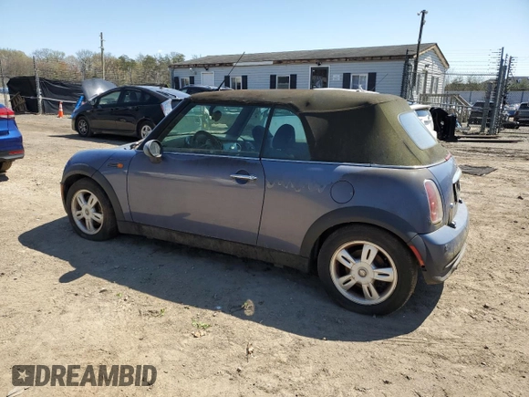 2006 MINI Convertible with VIN WMWRF33556TG14421, listed as a Copart auction lot 50090415 with 136,736 mi miles and Non repairable. Bid and sale history available at DreamBid. Image 2.