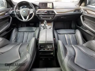 2018 BMW 5 Series 530i with VIN WBAJA5C54JG899845, listed as a Copart auction lot 83007584 with 57,379 mi miles and Salvage Title. Bid and sale history available at DreamBid. Image 8.