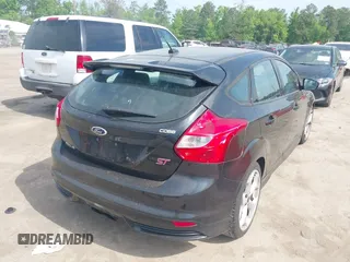 2014 Ford Focus ST with VIN 1FADP3L98EL269058, listed as a IAAI auction lot 42169021 with 106,325 mi miles and . Bid and sale history available at carsss.com. Image 4.