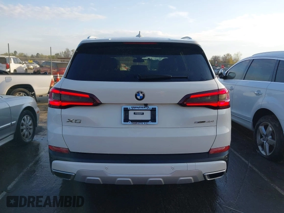 2021 BMW X5 sDrive40i with VIN 5UXCR4C07M9F23816, listed as a IAAI auction lot 41871364 with 55,401 mi miles. Bid and sale history available at carsss.com. Image 17.